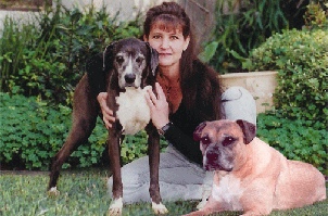 Toni Faragalli, co-founder of Dog Gone Tired Sanctuary and Rescue, and her dogs, Maxi and Spanky.